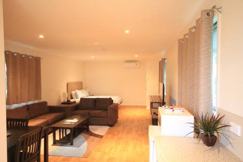 Imagen de la habitación del Motel Mossman Resort Holiday Villas. Foto 5