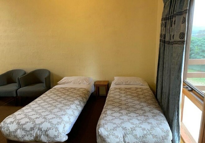 Imagen de la habitación del Motel Mountain Creek. Foto 28