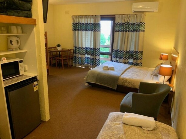 Imagen de la habitación del Motel Mountain Creek. Foto 32