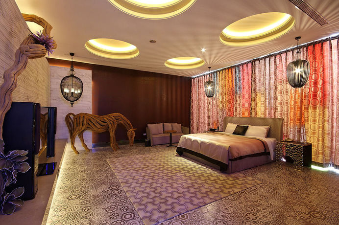Imagen de la habitación del Motel Mulan Taichung. Foto 13