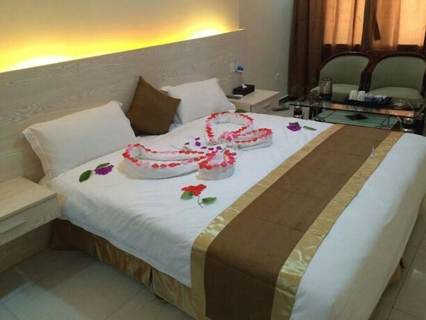 Imagen de la habitación del Motel Nanjing Restaurant and. Foto 12