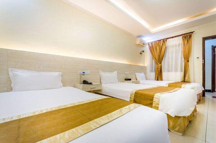 Imagen de la habitación del Motel Nanjing Restaurant and. Foto 15