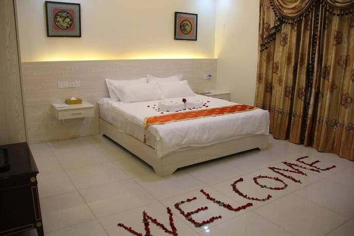 Imagen de la habitación del Motel Nanjing Restaurant and. Foto 22
