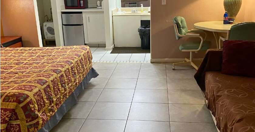 Imagen de la habitación del Motel New Sungate. Foto 7