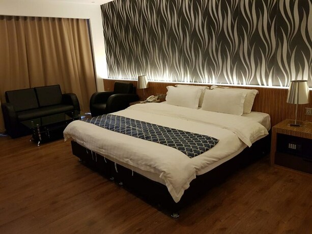 Imagen de la habitación del Motel New World, BINTULU. Foto 11