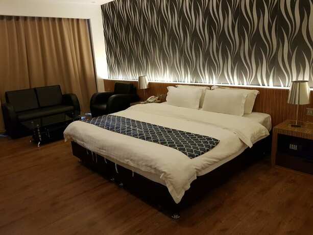 Imagen de la habitación del Motel New World, BINTULU. Foto 12