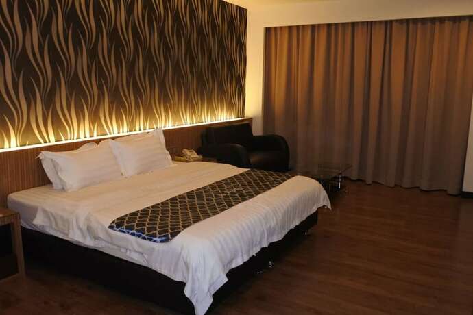 Imagen de la habitación del Motel New World, BINTULU. Foto 14