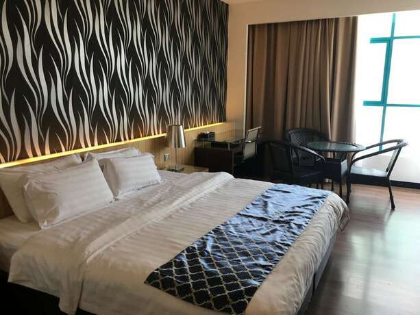 Imagen de la habitación del Motel New World, BINTULU. Foto 17