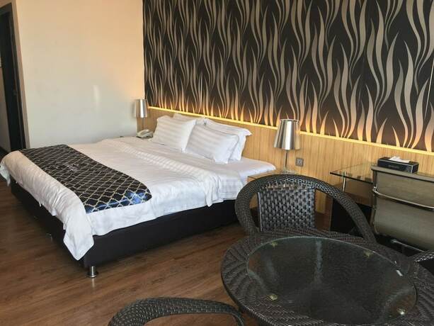Imagen de la habitación del Motel New World, BINTULU. Foto 21