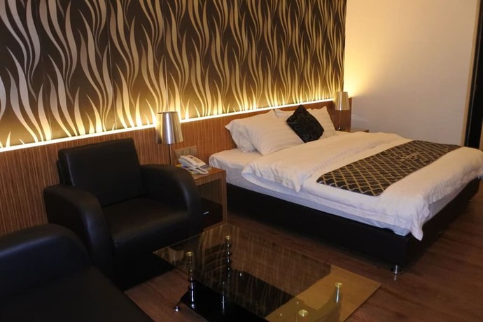 Imagen de la habitación del Motel New World, BINTULU. Foto 23