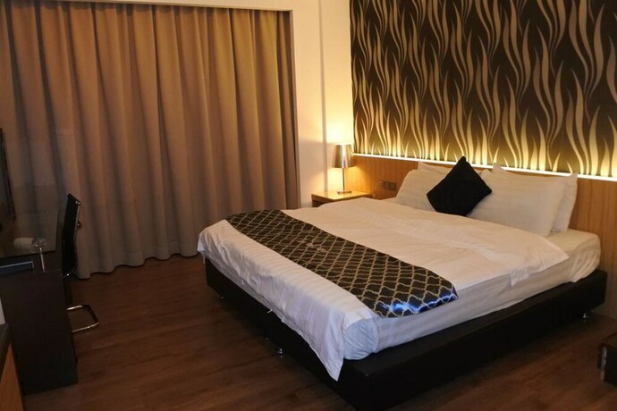 Imagen de la habitación del Motel New World, BINTULU. Foto 25