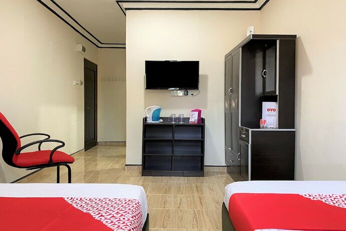 Imagen de la habitación del Motel OYO 90205 Bayu Sintok. Foto 21