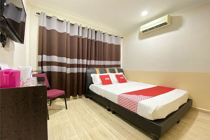 Imagen de la habitación del Motel OYO 90205 Bayu Sintok. Foto 25