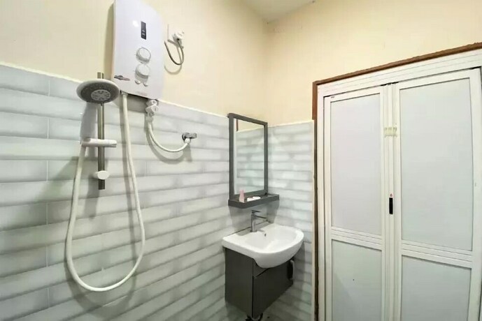 Imagen de la habitación del Motel OYO 90205 Bayu Sintok. Foto 29