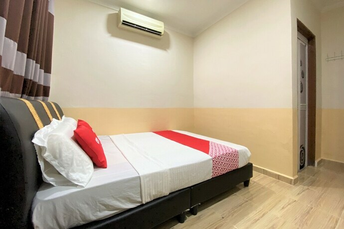 Imagen de la habitación del Motel OYO 90205 Bayu Sintok. Foto 30
