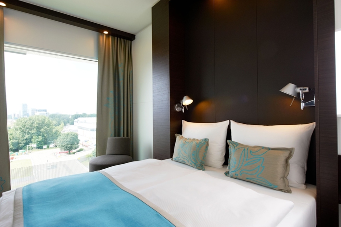 Imagen de la habitación del Motel One Amsterdam. Foto 12
