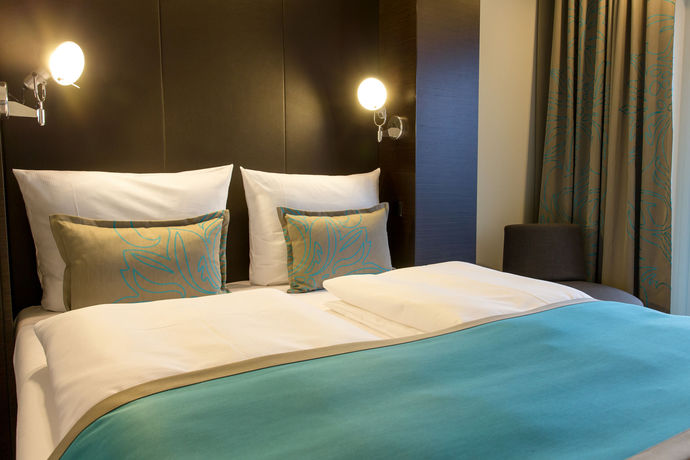 Imagen de la habitación del Motel One Basel. Foto 7