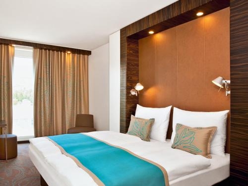 Imagen de la habitación del Motel One Dresden Am Zwinger. Foto 10
