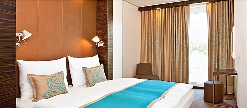 Imagen de la habitación del Motel One Essen. Foto 10