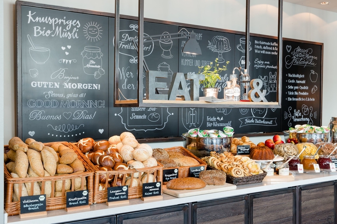 Imagen del bar/restaurante del Motel One Freiburg. Foto 15