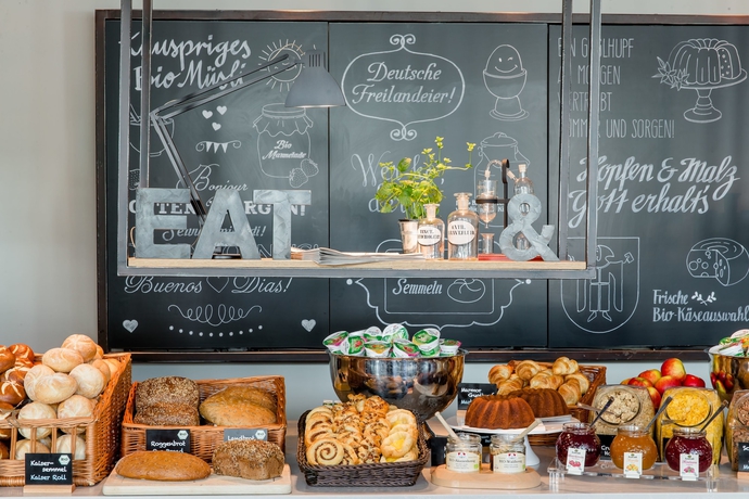 Imagen del bar/restaurante del Motel One Freiburg. Foto 16