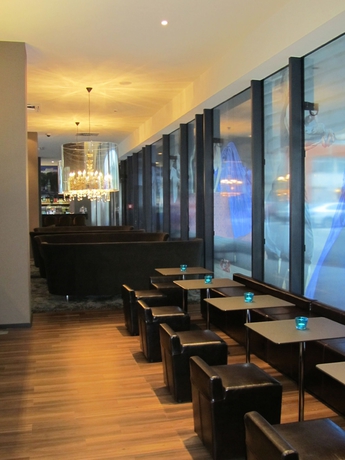 Imagen del bar/restaurante del Motel One Salzburg - Süd. Foto 4