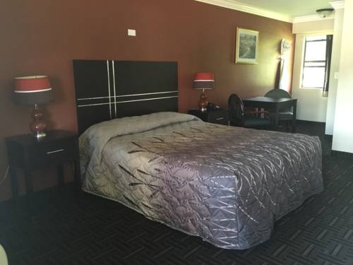 Imagen de la habitación del Motel Orange City - Orange City. Foto 6