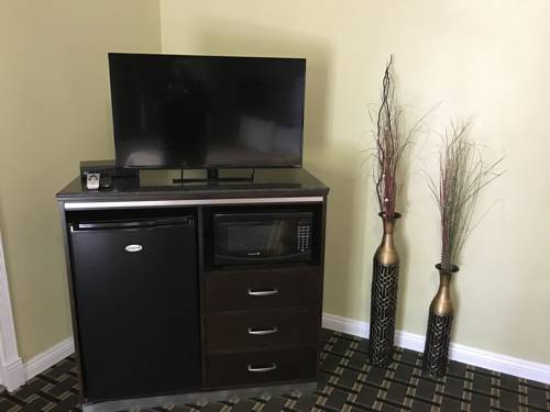 Imagen de la habitación del Motel Palm Tropics. Foto 5