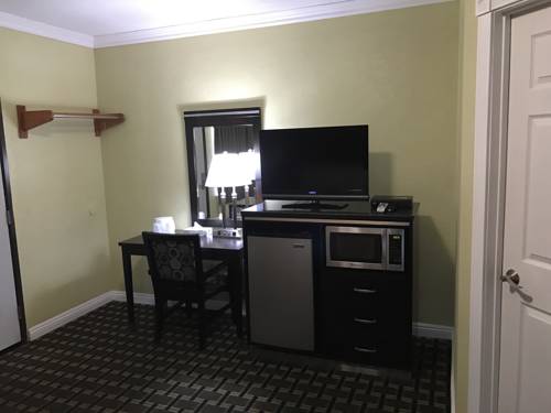 Imagen de la habitación del Motel Palm Tropics. Foto 8