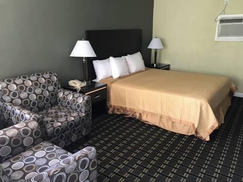 Imagen de la habitación del Motel Palm Tropics. Foto 11