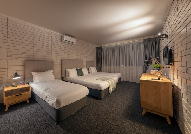 Imagen de la habitación del Motel Palms Hotel Chullora. Foto 7