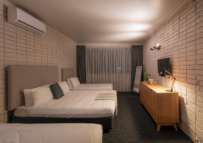Imagen de la habitación del Motel Palms Hotel Chullora. Foto 8