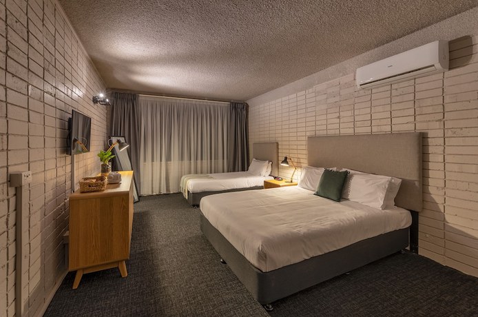 Imagen de la habitación del Motel Palms Hotel Chullora. Foto 10