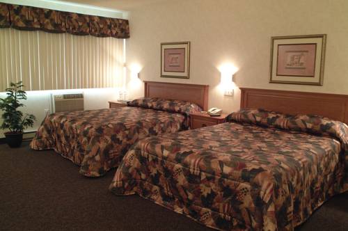 Imagen de la habitación del Motel Pignons Rouges. Foto 16