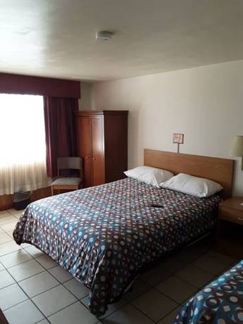 Imagen de la habitación del Motel Plaza Bryan. Foto 2