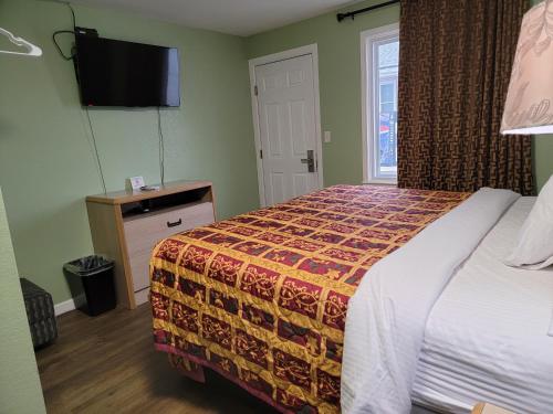 Imagen de la habitación del Motel Plaza, Joplin Area. Foto 14