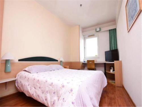 Imagen general del Motel Qingdao Development Zone Middle Changjiang R. Foto 1