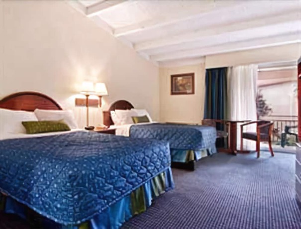 Imagen de la habitación del Motel Red Carpet Inn & Suites. Foto 8