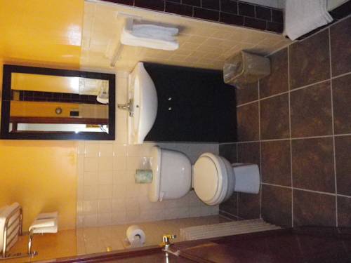 Imagen de la habitación del Motel Red Rose. Foto 9