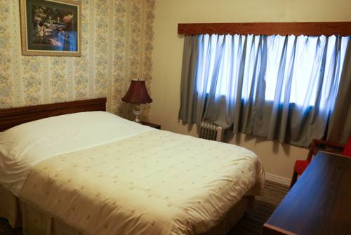 Imagen de la habitación del Motel River Heights. Foto 9