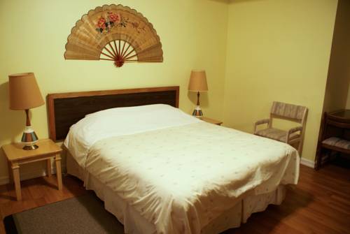 Imagen de la habitación del Motel River Heights. Foto 14