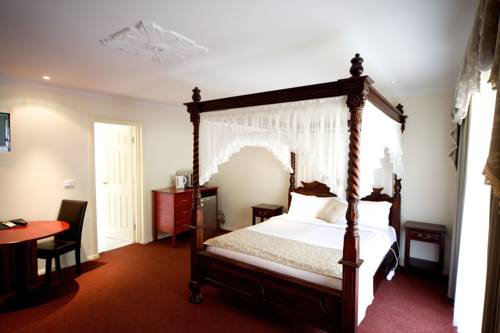 Imagen de la habitación del Motel Sanctuary House Resort. Foto 4