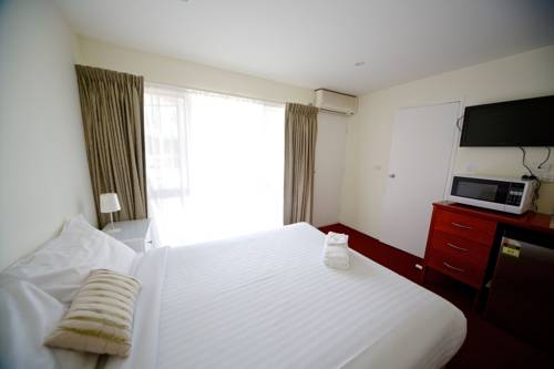 Imagen de la habitación del Motel Sanctuary House Resort. Foto 5