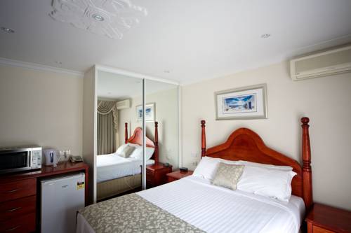 Imagen de la habitación del Motel Sanctuary House Resort. Foto 6