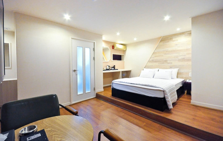 Imagen de la habitación del Motel Seven Songjeong. Foto 3