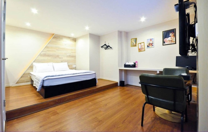 Imagen de la habitación del Motel Seven Songjeong. Foto 4