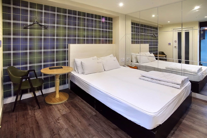 Imagen de la habitación del Motel Seven Songjeong. Foto 5