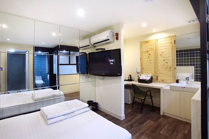 Imagen de la habitación del Motel Seven Songjeong. Foto 6