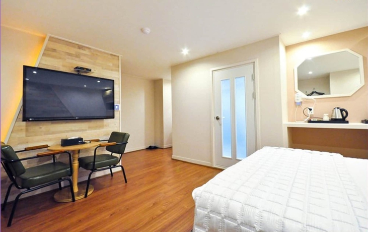 Imagen de la habitación del Motel Seven Songjeong. Foto 7