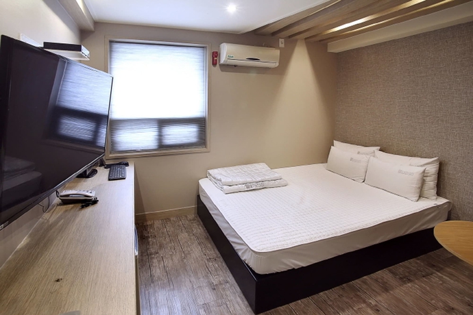 Imagen de la habitación del Motel Seven Songjeong. Foto 8